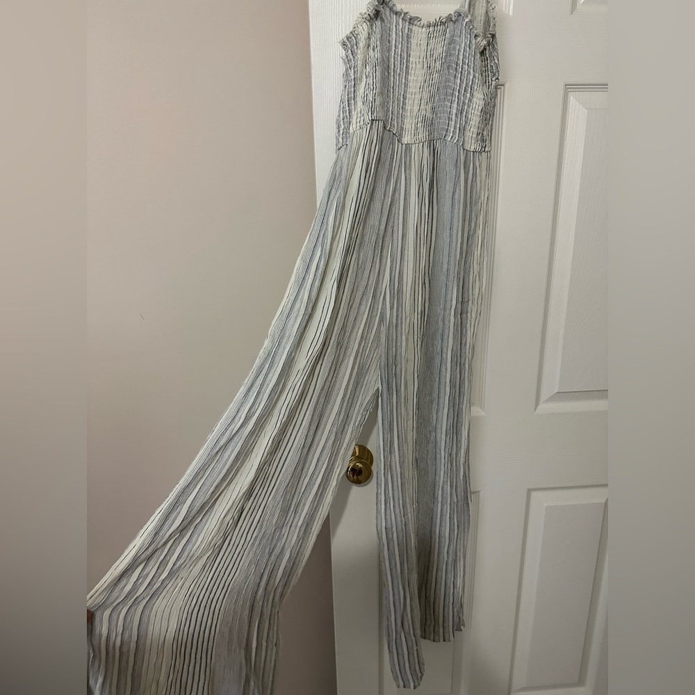 White and blue stripped jump suit